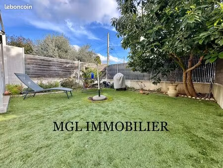 maison t4 de 83m2 avec 47m2 de jardin  un box garage et une place de parking privative - l