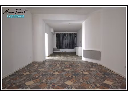 maison de ville 80 m² en semi plain pied  3 chambres avec garage  cour et jardinet