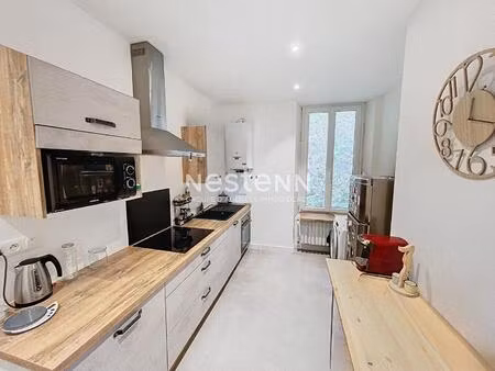 appartement 1er étage  centre-ville  avec garage et cave