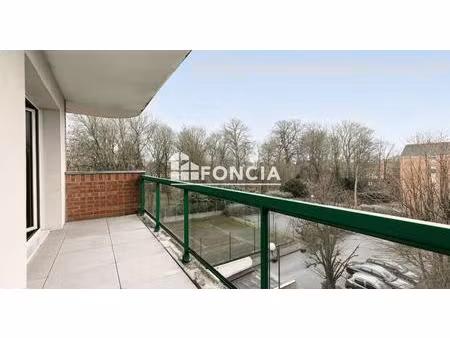 lille vauban - type 3 de 64 m2 avec balcon exposé sud est - garage et cave