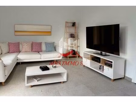 appartement rénové rez de jardin  de 23 2 m2 avec parking