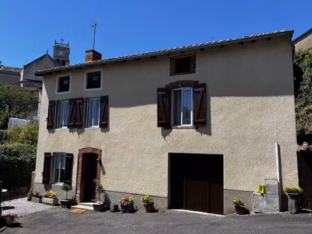 charmante maison de 2 chambres avec garage et jardin
