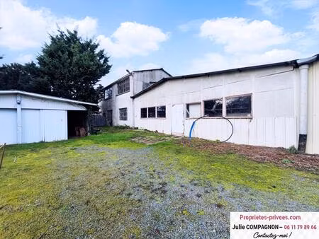 terrain avec grand atelier 400 m² bureau  garage et grenier