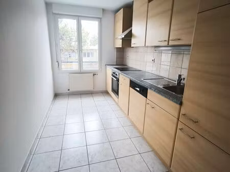 location appartement 70 m² rénové – village-neuf centre – balcon  garage  cave