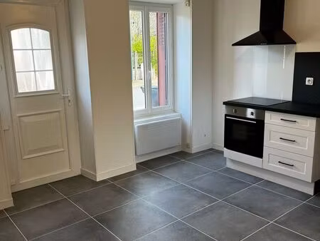 à louer - appartement au rez de chaussée avec terrain