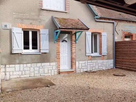 maison divisée en 2 logements