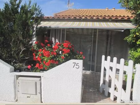 maison lumineuse avec mezzanine  véranda isolée et jardinet