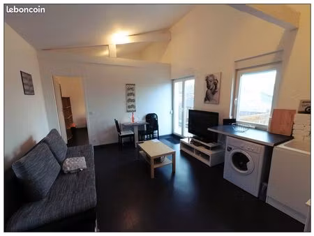 immeuble composé de 4 appartements + 4 garages + 4 jardins privatifs