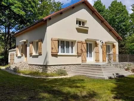 maison 4 pièces de 129 m²  sur terrain arboré et en partie constructible