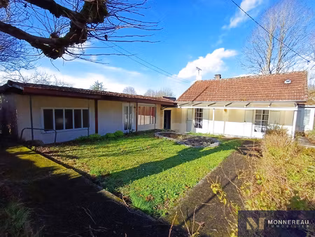 maison individuelle centre ville avec garage et terrain clos