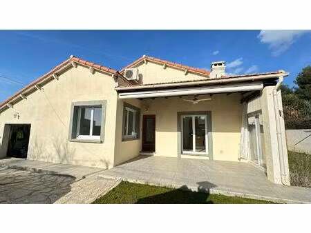 jolie maison des années 50 de plain pieds  avec jardin