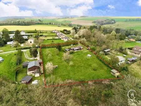 chalet à rénover sur une parcelle de 32 ares à vendre