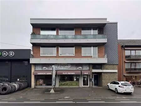 immeuble de rapport composé de 2 appartements et un rdc comm