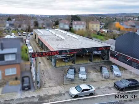 garage avec showroom  parking et atelier prêt à l'emploi !
