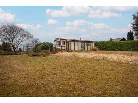 terrain à bâtir avec dépendances