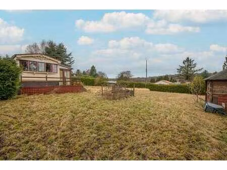 caravane résidentielle avec dépendances sur terrain à bâtir