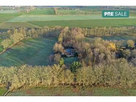 maison exceptionnellement située (14 953 m²) le long de haan