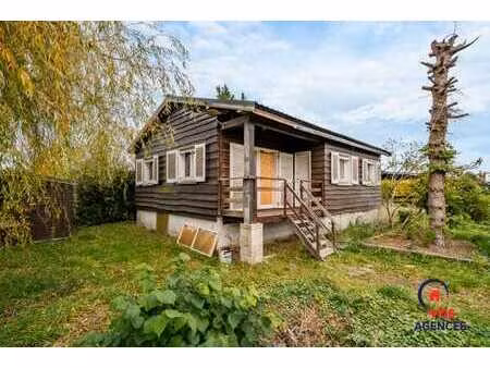 maison 4 façades sur une parcelle de 5 ares