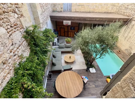 maison de village avec piscine plein coeur de vauvert (3060