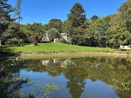 propriété avec maison de 184m2 sur parc paysager de 9244m2