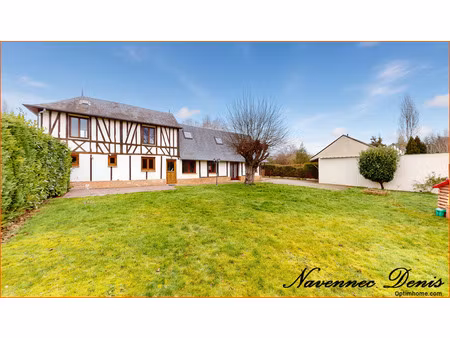 maison de charme avec 3 chambres et garage proche du centre-ville et des écoles – 220 000€