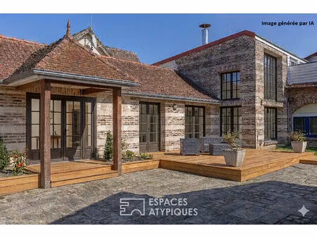 maison d'architecte avec piscine intérieure et fort potentiel à amiens sud