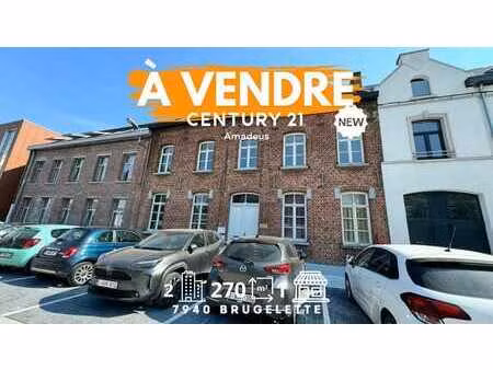 immeuble de rapport ( 2appartements et un commerce/bureau...