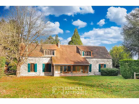longère de caractère et dépendances au coeur d'un parc arboré