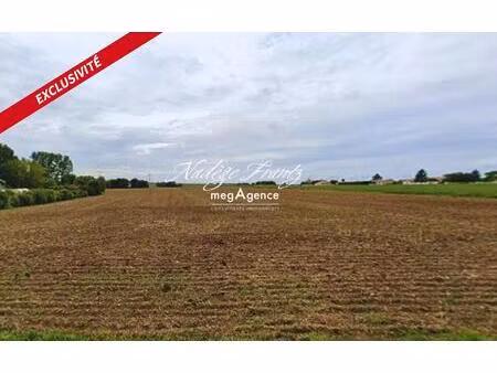 voissay – grande parcelle constructible avec double accès