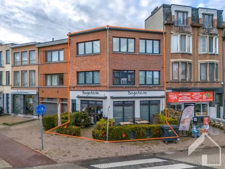 gelijkvloers handelspand met 2 appartementen