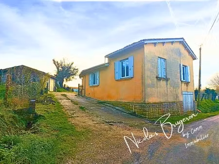 maison t4 à rénover avec cave  dépendance et un garage independent sur un terrain de 1500 