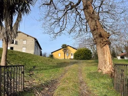 maison de campagne 4 chambres avec dépendances sur terrain 6000 m2 environ
