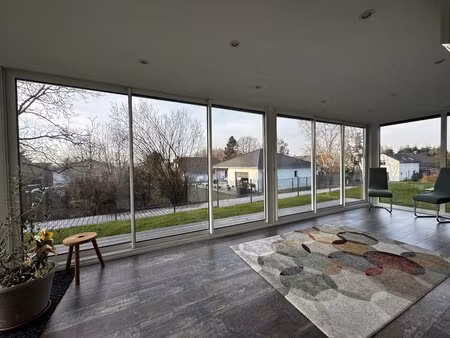 dannemarie – superbe appartement 5 pièces en rez-de-jardin avec véranda