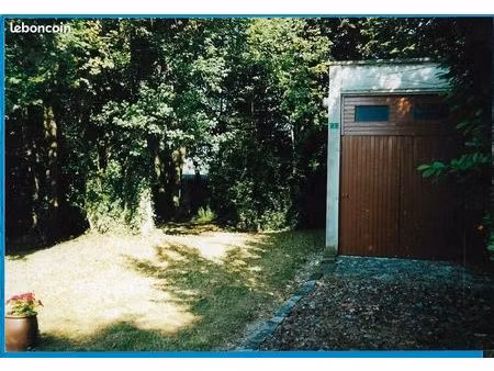 terrain arboré 1000 m² avec grands garages et maisonnette à caulaincourt (02490)es