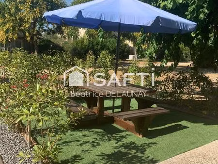 pavillon d'environ 43 m² et un parking