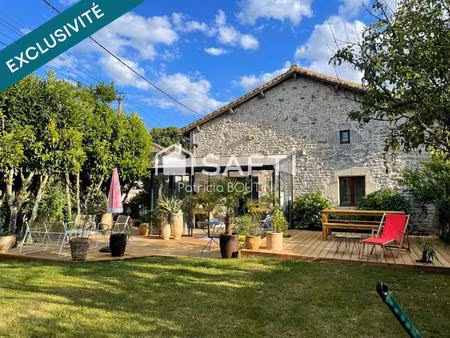 magnifique maison en pierre 3 chambres et 2 bureaux avec grange attenante !