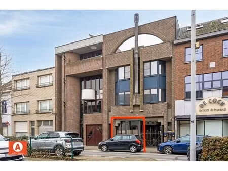 in optie - energiezuinig gelijkvloers app: 116 m²  pal bij het centrum.