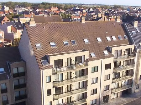 zonnig appartement in de duinenwijk van oostende . direct bij zee ! zeer goede belegging d