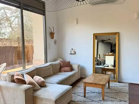 duplex t3 bis atypique avec jardin et parking