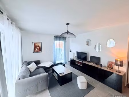 appartement 3 pièces 64 m² avec terrasse  cave et parkings