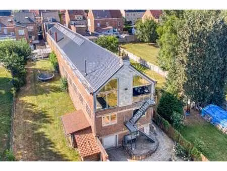 bâtiment polyvalent avec habitation et atelier