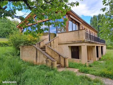 maison de 1981 d'environ 100 m² habitables  avec véranda de 25 m² & grand sous-sol avec ga