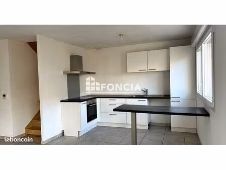 appartement t4 en duplex avec stationnement et garage en sous-sol