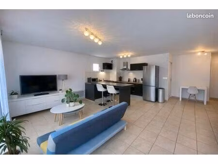 appartement t4 duplex lumineux avec balcon  cave  garage et parking