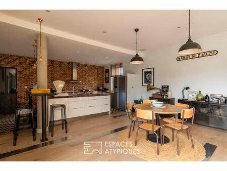 ancien atelier auto réhabilité en maison contemporaine