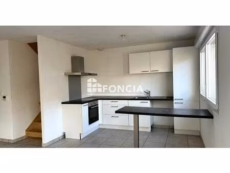 appartement t4 en duplex avec stationnement et garage en sous-sol