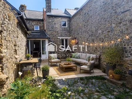 maison en pierre avec terrasse  jardin et vue dégagée