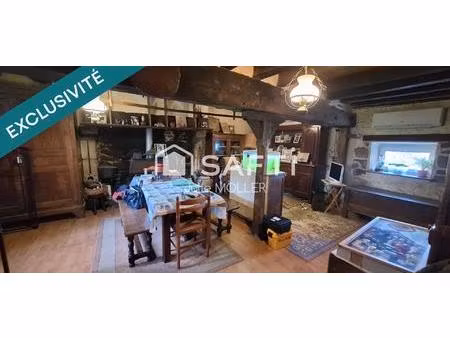 maison en pierre et poutres apparentes  à rénover