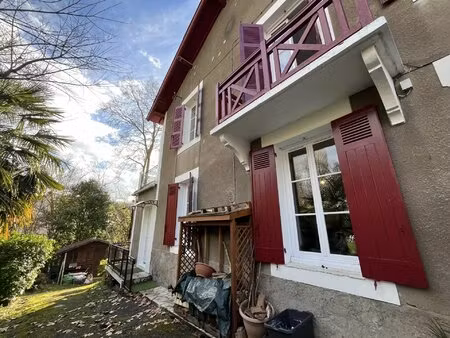 maison avec jardin à quelques minutes à pied du centre-ville