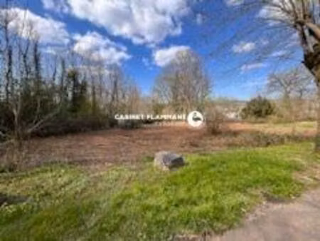 terrain 3 minutes à pieds de la gare et commerce